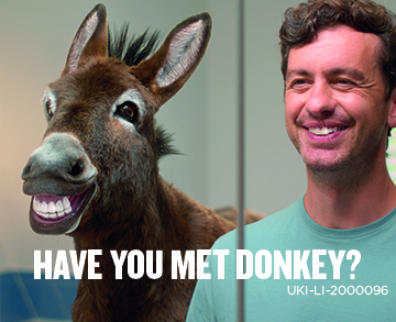 Have you met Donkey question featuring donkey and a man smiling in the bathroom mirror